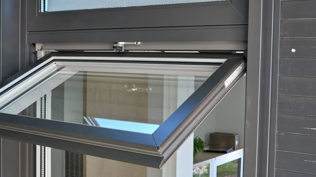 Tilt and turn window shown open in tilt position on a UK home